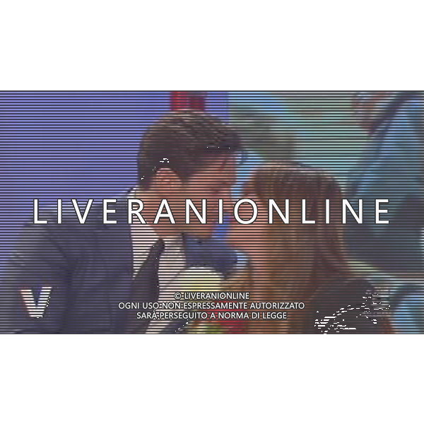 TRASMISSIONE TELEVISIVA\'VERISSIMO\' 17/04/2010 NELLA FOTO PIERSILVIO BERLUSCONI ENTRA NEGLI STUDI TELEVISIVI CON TRE ROSE PER SILVIA TOFFANIN ALL\'ULTIMA PUNTATA PRIMA DEL PARTO. IMMAGINI TELEVISIVE CANALE 5 OBBLIGATORIO CITARE LA FONTE TELEVISIVA AG ALDO LIVERANI