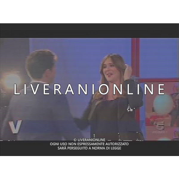 TRASMISSIONE TELEVISIVA\'VERISSIMO\' 17/04/2010 NELLA FOTO PIERSILVIO BERLUSCONI ENTRA NEGLI STUDI TELEVISIVI CON TRE ROSE PER SILVIA TOFFANIN ALL\'ULTIMA PUNTATA PRIMA DEL PARTO. IMMAGINI TELEVISIVE CANALE 5 OBBLIGATORIO CITARE LA FONTE TELEVISIVA AG ALDO LIVERANI