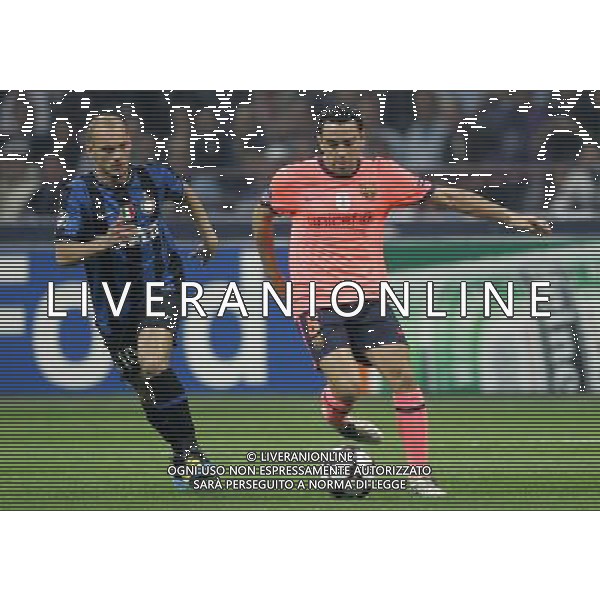 Milano 20-04-2010 Champions League 2009/2010 inter-barcellona 3:1 nella foto xavi hernandez e wesley sneijder ph marco luzzani/ag aldo liverani s.a.s.