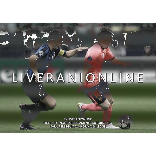 Milano 20-04-2010 Champions League 2009/2010 inter-barcellona 3:1 nella foto lionel messi e javier zanetti ph marco luzzani/ag aldo liverani s.a.s.