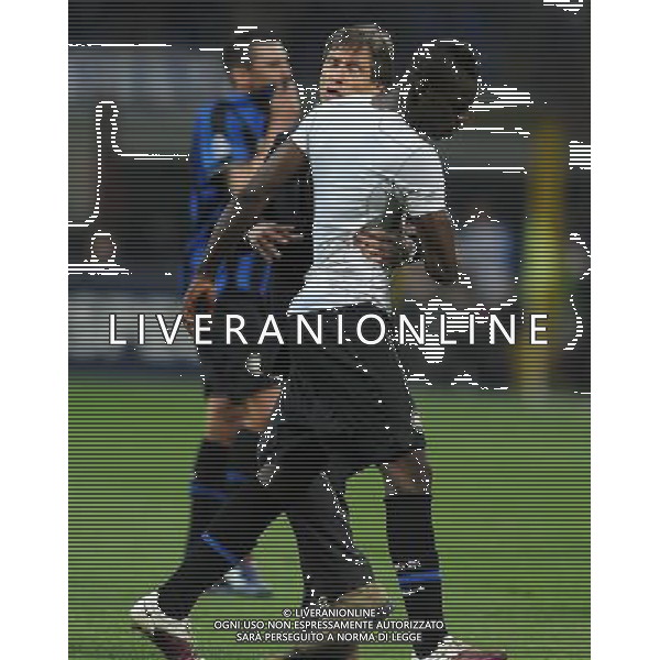 Champions League 2009/2010 Semifinale Andata Milano - 20.04.2010 Inter-Barcellona Nella Foto:ORIALI GABRIELE CERCA DI FERMARE BALOTELLI MARIO /Ph.Vitez-Ag. Aldo Liverani