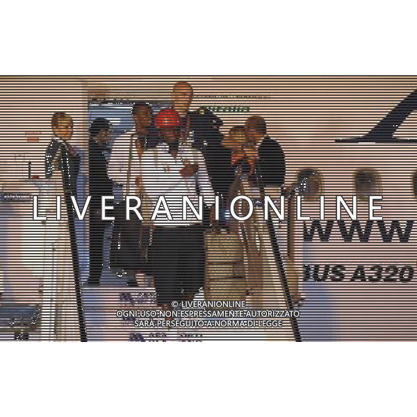 AEROPORTO DI MALPENSA TERMINAL 2 (VA) 23/05/2010 IL RIENTRO DA MADRID DEI GIOCATORI DELLA SQUADRA DELL\' INTER DOPO LA CONQUISTA DELLA COPPA DELLA CHAMPIONS LEAGUE NELLA FOTO SULLEY MUNTARI ©ROMANO/AGENZIA ALDO LIVERANI SAS