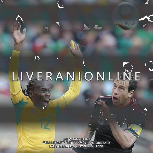 Fifa World Cup Sud Africa 2010 Match #1 Johannesburg (Soccer City Stadium) - 11.06.2010 Sud Africa-Messico Nella Foto:Letsholonyane Reneilwe-Torrado Gerardo /Ph.Vitez-Ag. Aldo Liverani