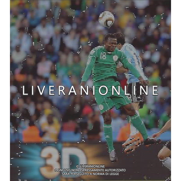 (100612) -- JOHANNESBURG, June 12, 2010 () -- Victor Obinna of Nigeria (front) heads the ball during a group B first round match against Argentina at the 2010 FIFA World Cup at Ellis Park stadium in Johannesburg, South Africa, on June 12, 2010. (/Wang Yuguo) (xm) ©Photoshot/Agenzia Aldo Liverani Sas - ITALY ONLY - ARGENTINA- USA FIFA WORLD CUP CAMPIONATI MONDIALI SUD AFRICA 2010