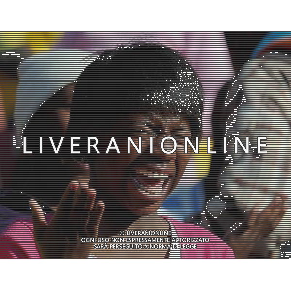 (100612) -- JOHANNESBURG, June 12, 2010 () -- A South Korean girl jubilates to see Argentina\'s coach Maradona prior to a group B first round match between Argentina and Nigeria at the 2010 FIFA World Cup at Ellis Park stadium in Johannesburg, South Africa, on June 12, 2010. (/Wang Yuguo) (xm) ©Photoshot/Agenzia Aldo Liverani Sas - ITALY ONLY - ARGENTINA- USA FIFA WORLD CUP CAMPIONATI MONDIALI SUD AFRICA 2010