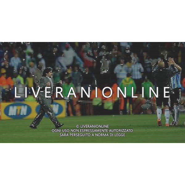 (100612) -- JOHANNESBURG, June 12, 2010 () -- Diego Maradona (L), the head coach of Argentina celebrates the victory after a group B first round match against Nigeria at the 2010 FIFA World Cup at Ellis Park stadium in Johannesburg, South Africa, on June 12, 2010. Argentina won 1-0. (/Wang Yuguo) (xm) ©Photoshot/Agenzia Aldo Liverani Sas - ITALY ONLY - ARGENTINA- USA FIFA WORLD CUP CAMPIONATI MONDIALI SUD AFRICA 2010
