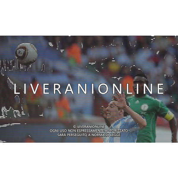 (100612) -- JOHANNESBURG, June 12, 2010 () -- Lionel Messi of Argentina (front) fights for the ball during a group B first round match against Nigeria at the 2010 FIFA World Cup at Ellis Park stadium in Johannesburg, South Africa, on June 12, 2010. Argentina won 1-0. (/Wang Yuguo) (xm) ©Photoshot/Agenzia Aldo Liverani Sas - ITALY ONLY - ARGENTINA- USA FIFA WORLD CUP CAMPIONATI MONDIALI SUD AFRICA 2010