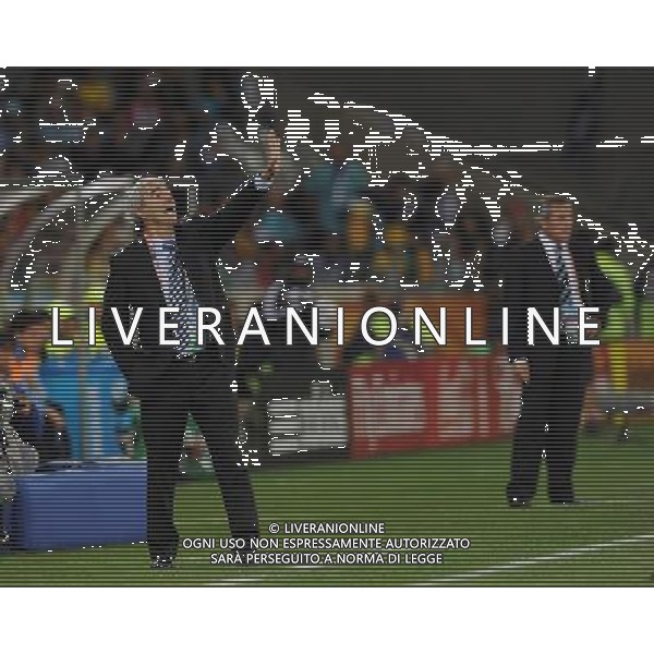(100612) -- CAPE TOWN, June 12, 2010 () -- French coach Raymond Domenech (L) reacts during a Group A match of the 2010 FIFA World Cup between France and Uruguay at Green Point stadium in Cape Town, South Africa, on June 11, 2010. The match ended with a 0-0 draw. (/Yang Lei) ©Photoshot/Agenzia Aldo Liverani Sas - ITALY ONLY - FRANCIA - URUGUAY FIFA WORLD CUP CAMPIONATI MONDIALI SUD AFRICA 2010
