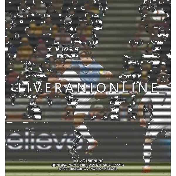 (100612) -- CAPE TOWN, June 12, 2010 () -- France\'s Florent Malouda (Front) vies with Uruguay\'s Diego Lugano (Back) during a Group A match of the 2010 FIFA World Cup at Green Point stadium in Cape Town, South Africa, on June 11, 2010. The match ended with a 0-0 draw. (/Xing Guangli) (dx) ©Photoshot/Agenzia Aldo Liverani Sas - ITALY ONLY - FRANCIA - URUGUAY FIFA WORLD CUP CAMPIONATI MONDIALI SUD AFRICA 2010