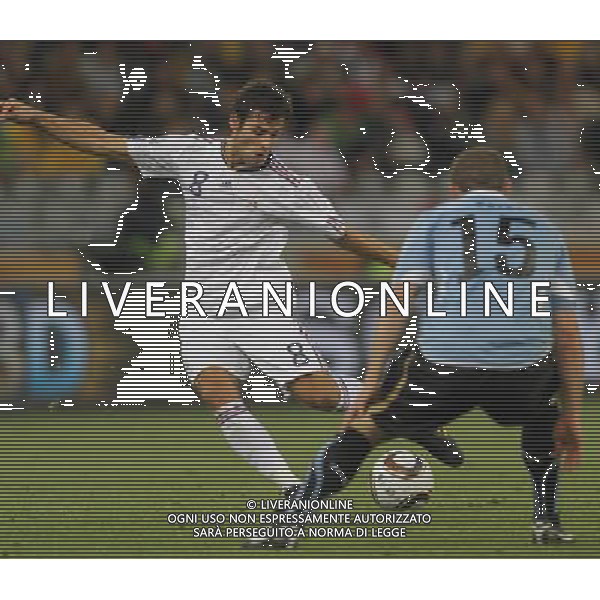 (100612) -- CAPE TOWN, June 12, 2010 () -- Yoann Gourcuff (L) of France vies with Diego Perez of Uruguay during a Group A match of the 2010 FIFA World Cup at the Green Point stadium in Cape Town, South Africa, on June 11, 2010. (/Xing Guangli) (kh) ©Photoshot/Agenzia Aldo Liverani Sas - ITALY ONLY - FRANCIA - URUGUAY FIFA WORLD CUP CAMPIONATI MONDIALI SUD AFRICA 2010