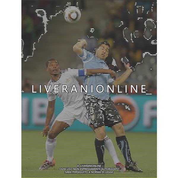(100612) -- CAPE TOWN, June 12, 2010 () -- French Patrice Evra (L) vies with Uruguay\'s Luis Suarez during a Group A match of the 2010 FIFA World Cup at the Green Point stadium in Cape Town, South Africa, on June 11, 2010. (/Xing Guangli) (dx) ©Photoshot/Agenzia Aldo Liverani Sas - ITALY ONLY - FRANCIA - URUGUAY FIFA WORLD CUP CAMPIONATI MONDIALI SUD AFRICA 2010