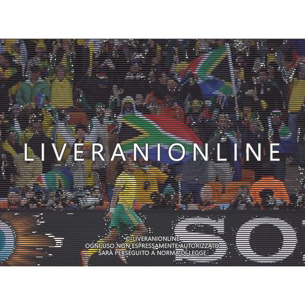 (100611) -- JOHANNESBURG, June 11, 2010 () -- South Africa\'s player Siphiwe Tshabalala celebrates a goal during a group A match of the 2010 FIFA World Cup against Mexico at Soccer City stadium in Soweto, suburban Johannesburg, on June 11, 2010. The match ended with a 1-1 tie. (/Guo Yong) (ljq) ©Photoshot/Agenzia Aldo Liverani Sas - ITALY ONLY: SUDAFRICA - MESSICO FIFA WORLD CUP CAMPIONATI MONDIALI SUD AFRICA 2010