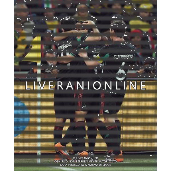 (100611) -- JOHANNESBURG, June 11, 2010 () -- Players of Mexico celebrate a goal during a group A match of the 2010 FIFA World Cup against South Africa at Soccer City stadium in Soweto, suburban Johannesburg, on June 11, 2010. The match ended with a 1-1 tie. (/Guo Yong) (ljq) ©Photoshot/Agenzia Aldo Liverani Sas - ITALY ONLY: SUDAFRICA - MESSICO FIFA WORLD CUP CAMPIONATI MONDIALI SUD AFRICA 2010