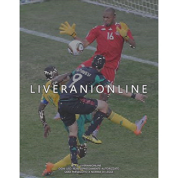 (100611) -- JOHANNESBURG, June 11, 2010 () -- South Africa\'s goalkeeper Itumeleng Khune (Top) saves the ball during a group A match of the 2010 FIFA World Cup against Mexico at Soccer City stadium in Soweto, suburban Johannesburg, on June 11, 2010. The match ended with a 1-1 tie. (/Li Ga) (ly) ©Photoshot/Agenzia Aldo Liverani Sas - ITALY ONLY: SUDAFRICA - MESSICO FIFA WORLD CUP CAMPIONATI MONDIALI SUD AFRICA 2010