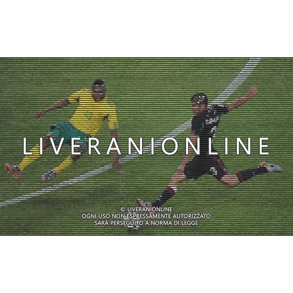 (100611) -- JOHANNESBURG, June 11, 2010 () -- Kagisho Dikgacoi (L) of South Africa vies with Carlos Salcido of Mexico during a group A match of the 2010 FIFA World Cup at Soccer City stadium in Soweto, suburban Johannesburg, on June 11, 2010. The match ended with a 1-1 tie. (/Li Ga) (ly) ©Photoshot/Agenzia Aldo Liverani Sas - ITALY ONLY: SUDAFRICA - MESSICO FIFA WORLD CUP CAMPIONATI MONDIALI SUD AFRICA 2010