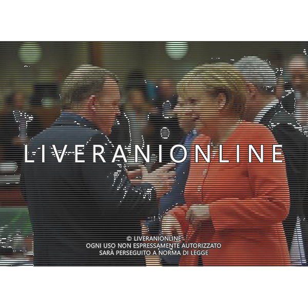 (100617) -- BRUSSELS, June 17, 2010 -- German Chancellor Angela Merkel (R) talks with Danish Prime Minister Lars Lokke Rasmussen during the European Union (EU) summit in Brussels June 17, 2010. Wu Wei) (nxl) ©Photoshot/Agenzia Aldo Liverani Sas - ITALY ONLY - Bruxelles: Vertice dei Leaders dell\'Unione Europea (UE) per adottare formalmente nuova strategia per la crescita e l\'occupazione per i prossimi 10 anni
