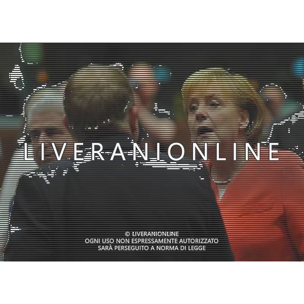 (100617) -- BRUSSELS, June 17, 2010 -- German Chancellor Angela Merkel (R) talks with Danish Prime Minister Lars Lokke Rasmussen during the European Union (EU) summit in Brussels June 17, 2010. Wu Wei) (nxl) ©Photoshot/Agenzia Aldo Liverani Sas - ITALY ONLY - Bruxelles: Vertice dei Leaders dell\'Unione Europea (UE) per adottare formalmente nuova strategia per la crescita e l\'occupazione per i prossimi 10 anni