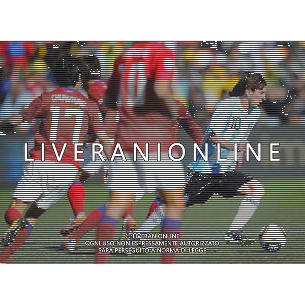 (100617) -- JOHANNESBURG, June 17, 2010 -- Argentina\'s Lionel Messi (R) moves with the ball during a 2010 World Cup Group B match between Argentina and South Korea at the Soccer City stadium in Soweto, suburban Johannesburg, South Africa, on June 17, 2010. Argentina beat South Korea 4-1. Wang Yuguo) (zc) ©Photoshot/Agenzia Aldo Liverani Sas - ITALY ONLY - ARGENTINA - COREA DEL SUD FIFA WORLD CUP CAMPIONATI MONDIALI SUD AFRICA 2010