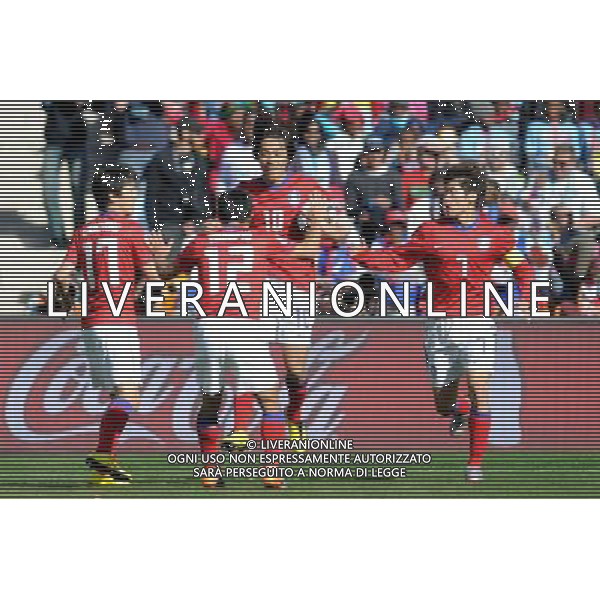 (100617) -- JOHANNESBURG, June 17, 2010 -- South Korea\'s Lee Chung-Yong (1st L) celebrates with his teammates after scoring during a 2010 World Cup Group B match between Argentina and South Korea at the Soccer City stadium in Soweto, suburban Johannesburg, South Africa, on June 17, 2010. Wang Yuguo) (zc) ©Photoshot/Agenzia Aldo Liverani Sas - ITALY ONLY - ARGENTINA - COREA DEL SUD FIFA WORLD CUP CAMPIONATI MONDIALI SUD AFRICA 2010