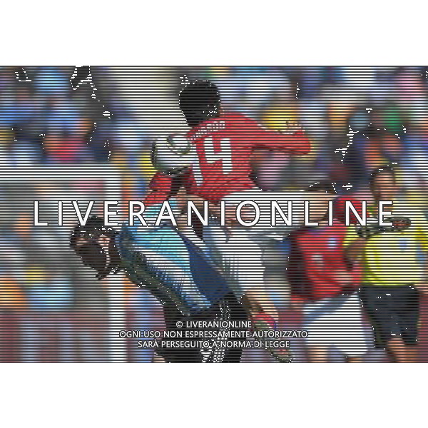 (100617) -- JOHANNESBURG, June 17, 2010 -- Argentina\'s Gonzalo Higua¬»n (L) fights for the ball with South Korea\'s Lee Jung-Soo during a 2010 World Cup Group B match between Argentina and South Korea at the Soccer City stadium in Soweto, suburban Johannesburg, South Africa, on June 17, 2010. Wang Yuguo) (zc) ©Photoshot/Agenzia Aldo Liverani Sas - ITALY ONLY - ARGENTINA - COREA DEL SUD FIFA WORLD CUP CAMPIONATI MONDIALI SUD AFRICA 2010