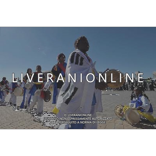 (100617) -- JOHANNESBURG, June 17, 2010 -- Local children of South Africa, dressed in South Korean traditional constumes, cheer for South Korean team prior to a Group B match between Argentina and South Korea outside the Soccer City stadium in Soweto, suburban Johannesburg, South Africa, on June 17, 2010. Wang Yuguo) (zc) ©Photoshot/Agenzia Aldo Liverani Sas - ITALY ONLY - ARGENTINA - COREA DEL SUD FIFA WORLD CUP CAMPIONATI MONDIALI SUD AFRICA 2010