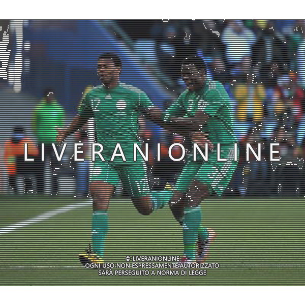 (100617) -- BLOEMFONTEIN, June 17, 2010 -- Nigeria\'s Kalu Uche (L) celebrates scoring during a 2010 World Cup Group B match between Greece and Nigeria at the Free State Stadium in Bloemfontein, South Africa, on June 17, 2010. Xu Suhui) (zc) ©Photoshot/Agenzia Aldo Liverani Sas - ITALY ONLY - GRECIA - NIGERIA FIFA WORLD CUP CAMPIONATI MONDIALI SUD AFRICA 2010