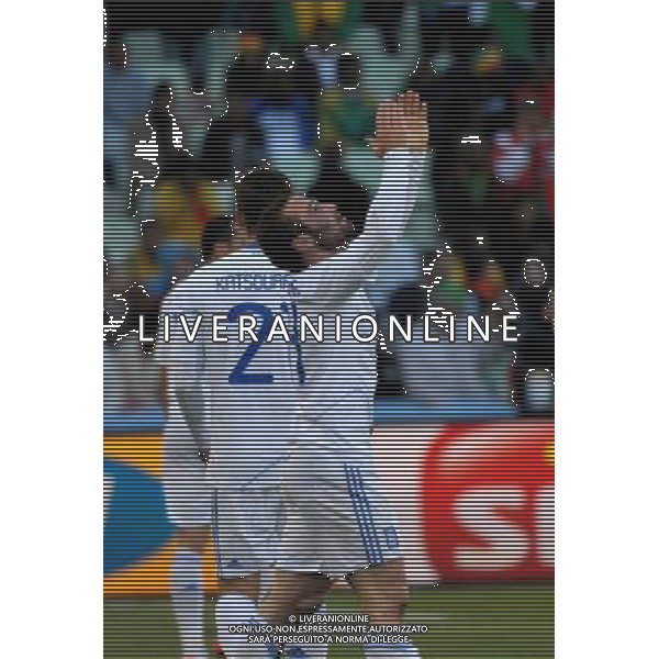 (100617) -- BLOEMFONTEIN, June 17, 2010 -- Greece\'s Dimitrios Salpingidis (Front) celebrates scoring during a 2010 World Cup Group B match between Greece and Nigeria at the Free State Stadium in Bloemfontein, South Africa, on June 17, 2010. Xu Suhui) (zc) ©Photoshot/Agenzia Aldo Liverani Sas - ITALY ONLY - GRECIA - NIGERIA FIFA WORLD CUP CAMPIONATI MONDIALI SUD AFRICA 2010