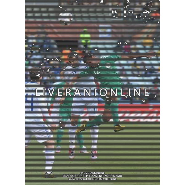 (100617) -- BLOEMFONTEIN, June 17, 2010 -- Nigeria\'s Kalu Uche (R) fights for the ball with Greece\'s Loukas Vintra during a 2010 World Cup Group B match between Greece and Nigeria at the Free State Stadium in Bloemfontein, South Africa, on June 17, 2010. Xu Suhui) (zc) ©Photoshot/Agenzia Aldo Liverani Sas - ITALY ONLY - GRECIA - NIGERIA FIFA WORLD CUP CAMPIONATI MONDIALI SUD AFRICA 2010