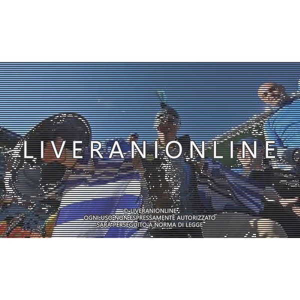 (100617) -- BLOEMFONTEIN, June 17, 2010 -- Greek supporters cheer prior to a 2010 World Cup Group B match between Greece and Nigeria at the Free State Stadium in Bloemfontein, South Africa, on June 17, 2010. Xu Suhui) (zc) ©Photoshot/Agenzia Aldo Liverani Sas - ITALY ONLY - GRECIA - NIGERIA FIFA WORLD CUP CAMPIONATI MONDIALI SUD AFRICA 2010