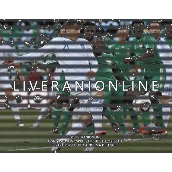 (100617) -- BLOEMFONTEIN, June 17, 2010 -- Greece\'s Kostas Katsouranis (L) vies with a player of Nigeria during a 2010 World Cup Group B match between Greece and Nigeria at the Free State Stadium in Bloemfontein, South Africa, on June 17, 2010. Greece beat Nigeria 2-1. Xu Suhui) (zc) ©Photoshot/Agenzia Aldo Liverani Sas - ITALY ONLY - GRECIA - NIGERIA FIFA WORLD CUP CAMPIONATI MONDIALI SUD AFRICA 2010