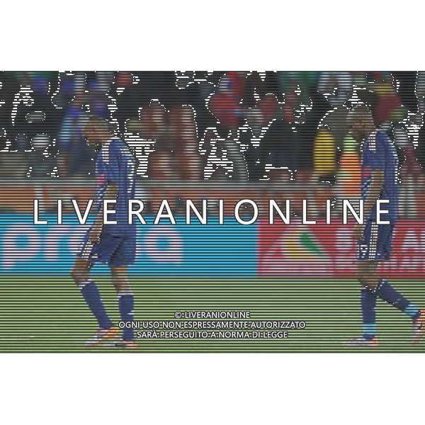 (100618) -- POLOKWANE, June 18, 2010 -delusione- France\'s Eric Abidal (L) and Abou Diaby leave the field after a 2010 World Cup Group A match against Mexico at the Peter Mokaba stadium in Polokwan, South Africa, on June 17, 2010. France lost 0-2. Li Ga) (kh) ©Photoshot/Agenzia Aldo Liverani Sas - ITALY ONLY: FRANCIA - MESSICO FIFA WORLD CUP CAMPIONATI MONDIALI SUD AFRICA 2010