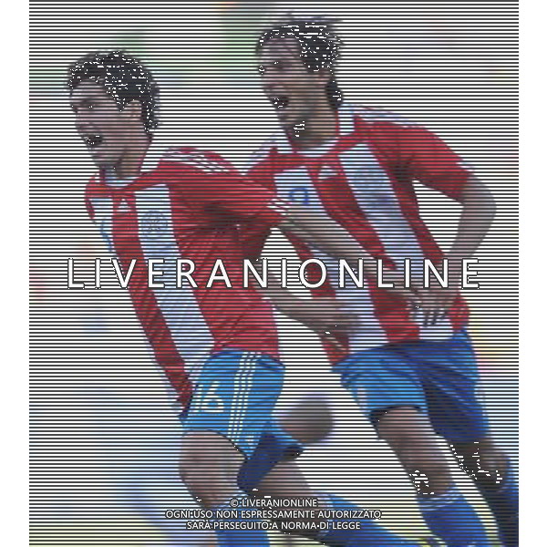 (100620) -- BLOEMFONTEIN, June 20, 2010 () -- Paraguay\'s Cristian Riveros (L) celebrates his scoring during the 2010 World Cup Group F football match against Slovakia at Free State Stadium in Bloemfontein, South Africa, on June 20, 2010. Paraguay won 2-0. (/Li Ga)(kh) ©Photoshot/Agenzia Aldo Liverani Sas - ITALY ONLY: PARAGUAY - SLOVACCHIA FIFA WORLD CUP CAMPIONATI MONDIALI SUD AFRICA 2010