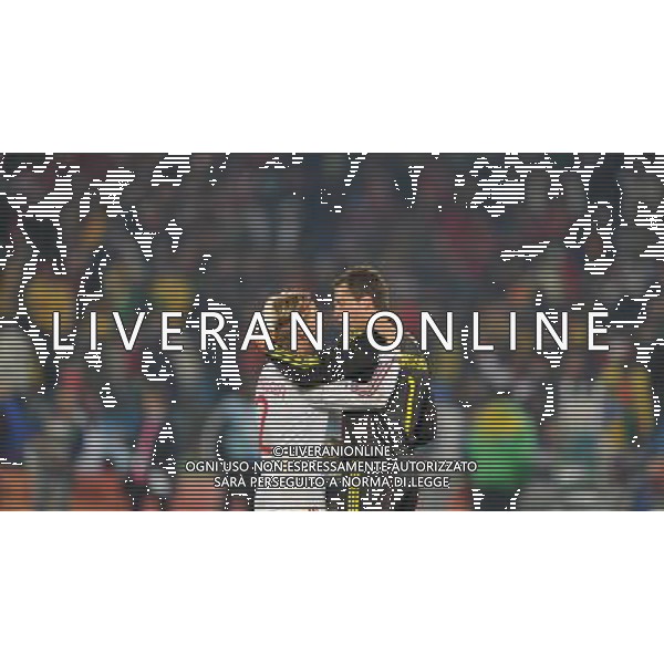 (100620) -- TSHWANE, June 20, 2010 () --Thomas Sorensen of Denmark(R) celebrates the victory with his teammates Christian Bager Poulsen after the 2010 World Cup Group E soccer match against Cameroon at Loftus Verfeld stadium in Tshwane, South Africa, on June 19, 2010. (/Yang Lei)(fym) ©Photoshot/Agenzia Aldo Liverani Sas - ITALY ONLY - CAMERUN - DANIMARCA FIFA WORLD CUP CAMPIONATI MONDIALI SUD AFRICA 2010