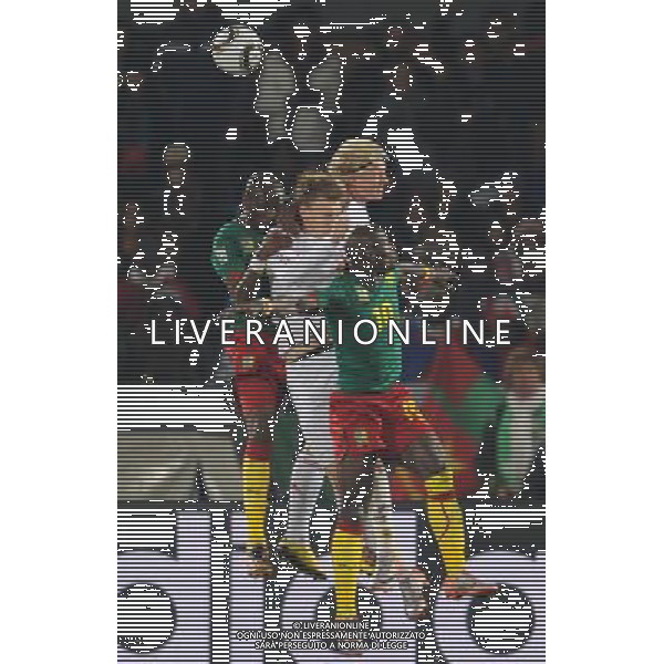 (100620) -- TSHWANE, June 20, 2010 () -- Cameroon\'s Achille Emana (R front) vies with Denmark\'s two players during their 2010 World Cup Group E soccer match at Loftus Versfeld stadium in Tshwane, South Africa, June 19, 2010. (/Wang Yuguo) (ly) ©Photoshot/Agenzia Aldo Liverani Sas - ITALY ONLY - CAMERUN - DANIMARCA FIFA WORLD CUP CAMPIONATI MONDIALI SUD AFRICA 2010