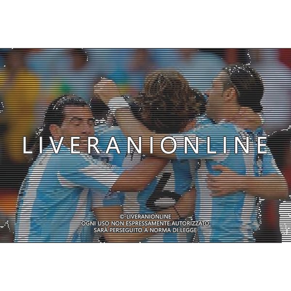 Argentina\'s Carlos Tevez (L), Gabriel Heinze (C) and Martin Demichelis (R) celebrate a goal during the World Cup group B soccer match between Argentina and South Korea at Soccer City in Johannesburg, South Africa, Thursday, June 17, 2010. Argentina defeated South Korea 4-1.(Photo By Wei Zheng/ColorChinaPhoto) - Ag. Aldo Liverani sas ITALY ONLY ITALY ONLY: ARGENTINA - COREA DEL SUD FIFA WORLD CUP CAMPIONATI MONDIALI SUD AFRICA 2010 ESULTANZA