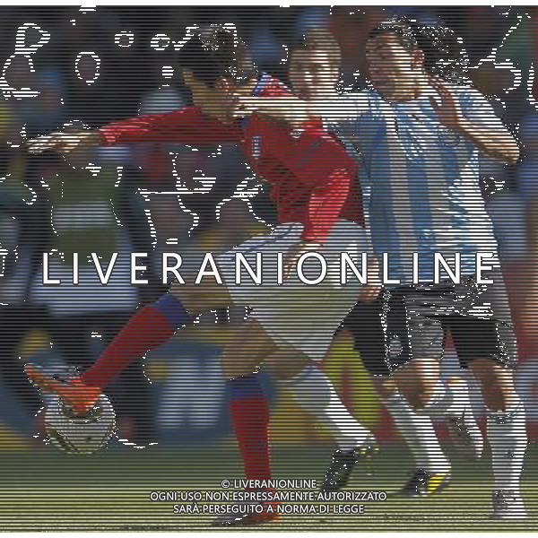 Argentina\'s Carlos Tevez (R) fights for the ball with South Korea\'s Kim Nam Il during the World Cup group B soccer match between Argentina and South Korea at Soccer City in Johannesburg, South Africa, Thursday, June 17, 2010. Argentina defeated South Korea 4-1.(Photo By Wei Zheng/ColorChinaPhoto) - Ag. Aldo Liverani sas ITALY ONLY ITALY ONLY: ARGENTINA - COREA DEL SUD FIFA WORLD CUP CAMPIONATI MONDIALI SUD AFRICA 2010