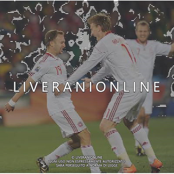 (100620) -- TSHWANE, June 20, 2010 () -- Denmark\'s Dennis Rommedahl (L) jubilates with his teammate after scoring during the 2010 World Cup Group E soccer match against Cameroon at Loftus Versfeld stadium in Tshwane, South Africa, June 19, 2010. (/Wang Yuguo) (ly) ©Photoshot/Agenzia Aldo Liverani Sas - ITALY ONLY: CAMERUN - DANIMARCA FIFA WORLD CUP CAMPIONATI MONDIALI SUD AFRICA 2010