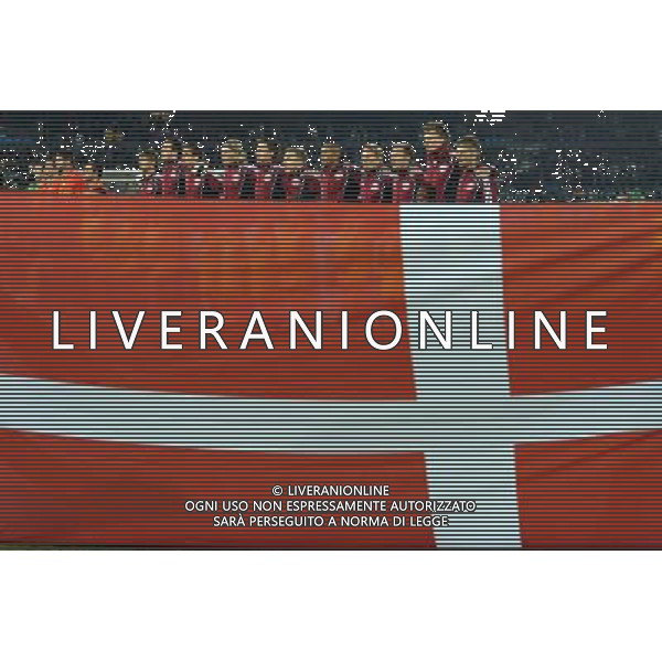 (100620) -- TSHWANE, June 20, 2010 () -- Denmark\'s starting players sing their national anthem prior to the 2010 World Cup Group E soccer match against Cameroon at Loftus Versfeld stadium in Tshwane, South Africa, June 19, 2010. (/Wang Yuguo) (ly) ©Photoshot/Agenzia Aldo Liverani Sas - ITALY ONLY: CAMERUN - DANIMARCA FIFA WORLD CUP CAMPIONATI MONDIALI SUD AFRICA 2010