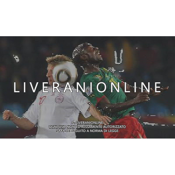 (100620) -- TSHWANE, June 20, 2010 () --Cameroon\'s Pierre Webo (R) heads the ball with Lars Martin Jorgensen of Denmark during the 2010 World Cup Group E soccer match at Loftus Verfeld stadium in Tshwane, South Africa, on June 19, 2010. (/Yang Lei)(dl) ©Photoshot/Agenzia Aldo Liverani Sas - ITALY ONLY: CAMERUN - DANIMARCA FIFA WORLD CUP CAMPIONATI MONDIALI SUD AFRICA 2010