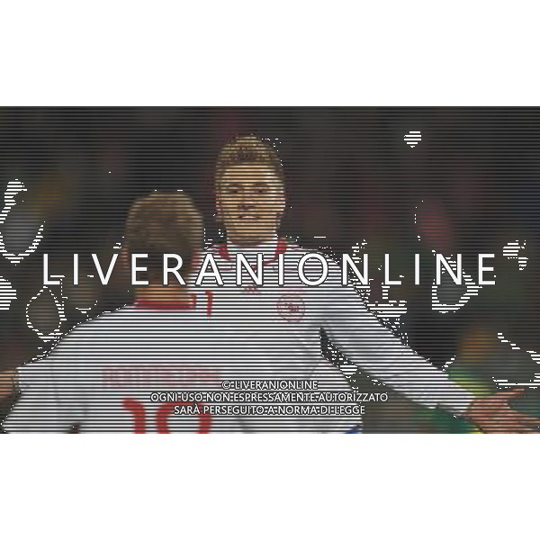 (100620) -- TSHWANE, June 20, 2010 () --Nicklas Bendtner of Denmark(R) celebrates after scoring during the 2010 World Cup Group E soccer match against Cameroon at Loftus Verfeld stadium in Tshwane, South Africa, on June 19, 2010. (/Yang Lei)(fym) ©Photoshot/Agenzia Aldo Liverani Sas - ITALY ONLY: CAMERUN - DANIMARCA FIFA WORLD CUP CAMPIONATI MONDIALI SUD AFRICA 2010