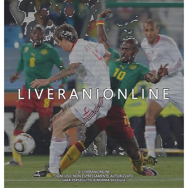 (100620) -- TSHWANE, June 20, 2010 () -- Cameroon\'s Achille Emana (R front) vies with Denmark\'s Daniel Agger during their 2010 World Cup Group E soccer match at Loftus Versfeld stadium in Tshwane, South Africa, June 19, 2010. (/Wang Yuguo) (ly) ©Photoshot/Agenzia Aldo Liverani Sas - ITALY ONLY: CAMERUN - DANIMARCA FIFA WORLD CUP CAMPIONATI MONDIALI SUD AFRICA 2010
