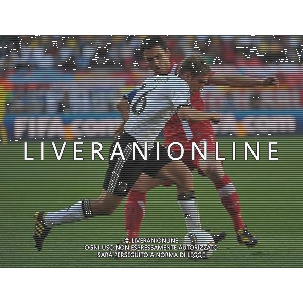 (100618) -- PORT ELIZABETH, June 18, 2010 -- Germany\'s Philipp Lahm (Front) drives tje ball during the 2010 World Cup Group D soccer match against Serbia at the Nelson Mandela Bay stadium in Port Elizabeth, South Africa, on June 18, 2010. Germany lost the match 0-1. Yang Lei) (zc) ©Photoshot/Agenzia Aldo Liverani Sas - ITALY ONLY: GERMANIA - SERBIA FIFA WORLD CUP CAMPIONATI MONDIALI SUD AFRICA 2010