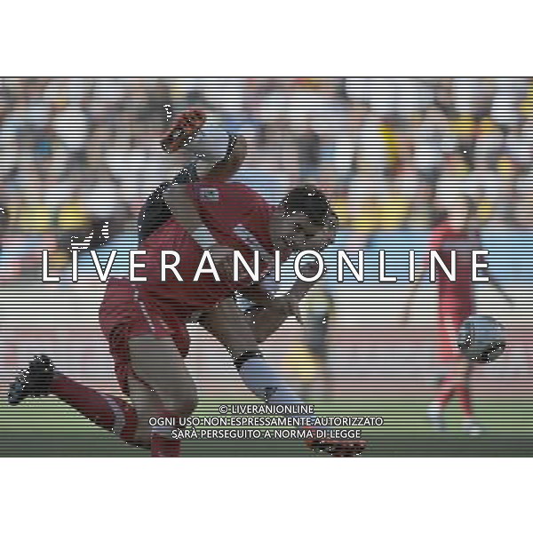 (100618) -- PORT ELIZABETH, June 18, 2010 -- Serbia\'s Aleksandar Kolarov (Bottom) vies with a player of Germany during the 2010 World Cup Group D soccer match between Germany and Serbia at the Nelson Mandela Bay stadium in Port Elizabeth, South Africa, on June 18, 2010.Yang Lei) (zc) ©Photoshot/Agenzia Aldo Liverani Sas - ITALY ONLY: GERMANIA - SERBIA FIFA WORLD CUP CAMPIONATI MONDIALI SUD AFRICA 2010