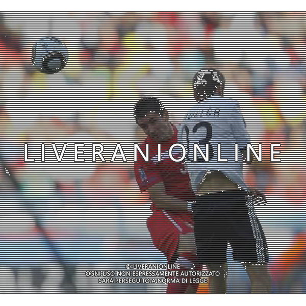 (100618) -- PORT ELIZABETH, June 18, 2010 -- Germany\'s Thomas Muller (R) vies with a player of Serbia during the 2010 World Cup Group D soccer match between Germany and Serbia at the Nelson Mandela Bay stadium in Port Elizabeth, South Africa, on June 18, 2010. Liao Yujie) (zc) ©Photoshot/Agenzia Aldo Liverani Sas - ITALY ONLY: GERMANIA - SERBIA FIFA WORLD CUP CAMPIONATI MONDIALI SUD AFRICA 2010