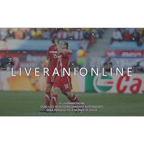 (100618) -- PORT ELIZABETH, June 18, 2010 -- Serbia\'s Milan Jovanovic (R) celebrates with his teammates after scoring during the 2010 World Cup Group D soccer match between Germany and Serbia at the Nelson Mandela Bay stadium in Port Elizabeth, South Africa, on June 18, 2010. Liao Yujie) (zc) ©Photoshot/Agenzia Aldo Liverani Sas - ITALY ONLY: GERMANIA - SERBIA FIFA WORLD CUP CAMPIONATI MONDIALI SUD AFRICA 2010