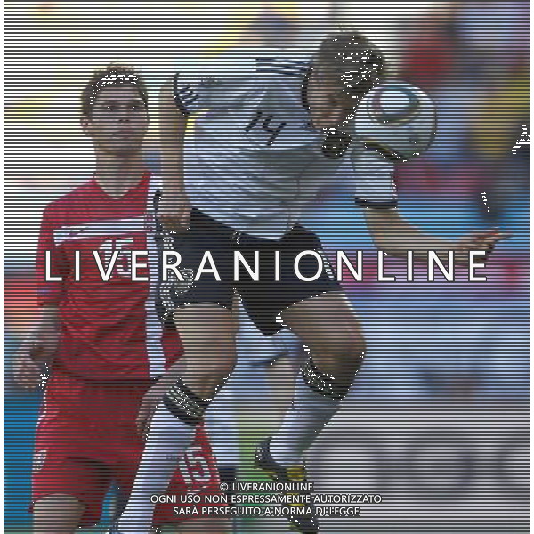 (100618) -- PORT ELIZABETH, June 18, 2010 -- Germany\'s Holger Badstuber (Front) heads the ball during the 2010 World Cup Group D soccer match between Germany and Serbia at the Nelson Mandela Bay stadium in Port Elizabeth, South Africa, on June 18, 2010. Liao Yujie) (zc) ©Photoshot/Agenzia Aldo Liverani Sas - ITALY ONLY: GERMANIA - SERBIA FIFA WORLD CUP CAMPIONATI MONDIALI SUD AFRICA 2010