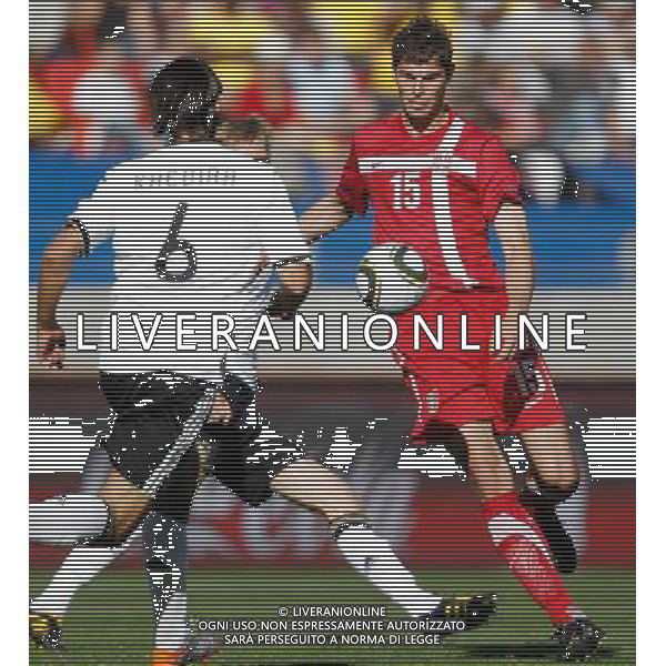(100618) -- PORT ELIZABETH, June 18, 2010 -- Germany\'s Nikola Zigic (R) vies with a player of Serbia during the 2010 World Cup Group D soccer match between Germany and Serbia at the Nelson Mandela Bay stadium in Port Elizabeth, South Africa, on June 18, 2010 Liao Yujie) (zc) ©Photoshot/Agenzia Aldo Liverani Sas - ITALY ONLY: GERMANIA - SERBIA FIFA WORLD CUP CAMPIONATI MONDIALI SUD AFRICA 2010