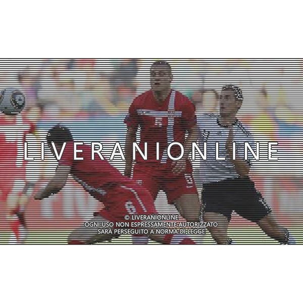 (100618) -- PORT ELIZABETH, June 18, 2010 -- Serbia\'s Branislav Ivanovic (L) heads the ball during the 2010 World Cup Group D soccer match between Germany and Serbia at the Nelson Mandela Bay stadium in Port Elizabeth, South Africa, on June 18, 2010. Liao Yujie) (zc) ©Photoshot/Agenzia Aldo Liverani Sas - ITALY ONLY: GERMANIA - SERBIA FIFA WORLD CUP CAMPIONATI MONDIALI SUD AFRICA 2010