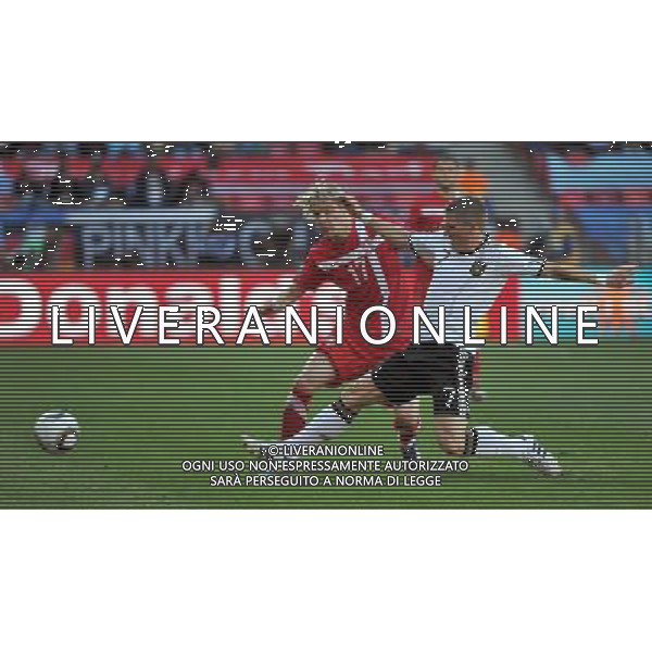 (100618) -- PORT ELIZABETH, June 18, 2010 -- Germany\'s Bastian Schweinsteiger (L) vies with Serbia\'s Milos Krasic during the 2010 World Cup Group D soccer match between Germany and Serbia at the Nelson Mandela Bay stadium in Port Elizabeth, South Africa, on June 18, 2010. Yang Lei) ©Photoshot/Agenzia Aldo Liverani Sas - ITALY ONLY: GERMANIA - SERBIA FIFA WORLD CUP CAMPIONATI MONDIALI SUD AFRICA 2010