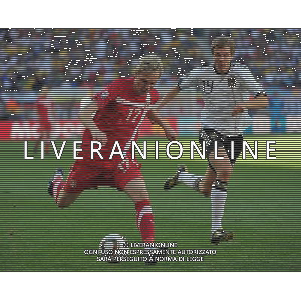 (100618) -- PORT ELIZABETH, June 18, 2010 --Serbia\'s Milos Krasic (L) drives the ball during the 2010 World Cup Group D soccer match between Germany and Serbia at the Nelson Mandela Bay stadium in Port Elizabeth, South Africa, on June 18, 2010.Yang Lei) (zc) ©Photoshot/Agenzia Aldo Liverani Sas - ITALY ONLY: GERMANIA - SERBIA FIFA WORLD CUP CAMPIONATI MONDIALI SUD AFRICA 2010